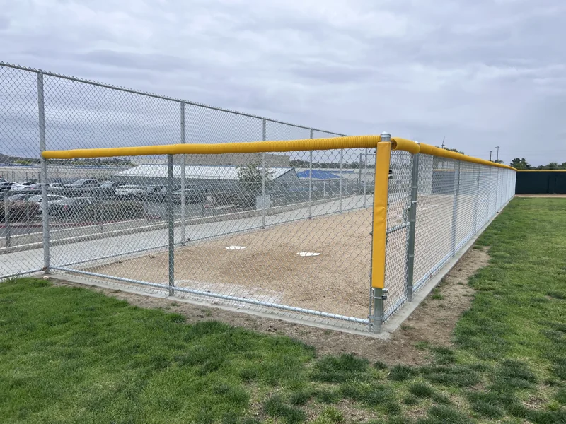 Athletic field chain-link fencing